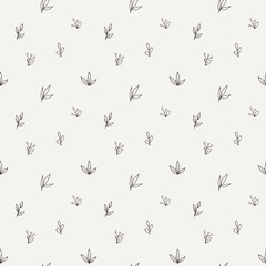 Vector seamless pattern of a variety of hand-drawn leaves and branches. Doodle
