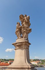 Fototapeta na wymiar Statue of St. Anne (mother of the Virgin Mary) on Charles Bridge