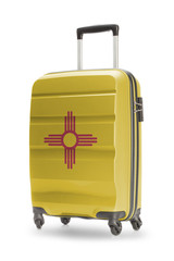 Suitcase with US state flag on it - New Mexico