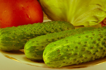 Cucumber and tomato with measuring