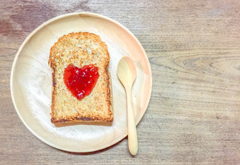 jam forming a heart on a toast