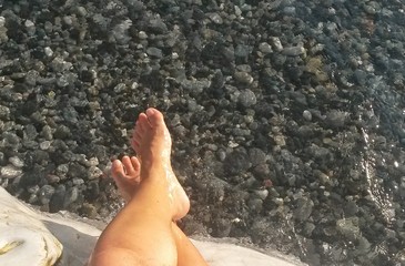 Wet legs ovet rock To The seashore