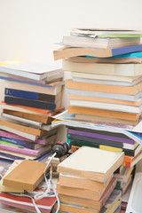 pile old books on table