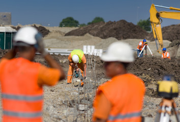 Construcyion workers at building site