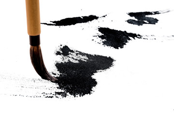 Chinese brushes draw on white papers