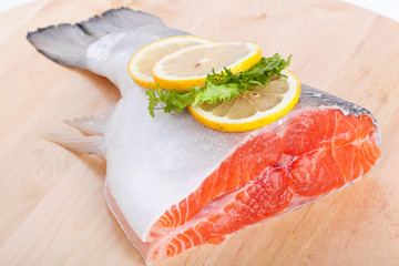 Trout on wooden cutting board