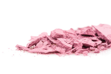Crushed eyeshadows on white background