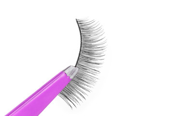 False lashes and pink pincers