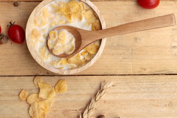 corn flake and milk with fresh cherry tomatoes.