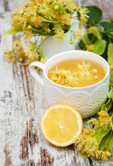 Cup of herbal tea with linden flowers