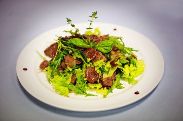 original salade with mushrooms isolated on white background