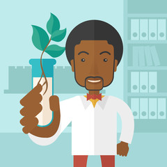 Black guy Chemist with tube and eco leaves.