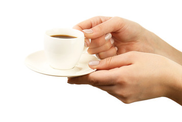 Female hands holding cup of coffee with saucer isolated on white