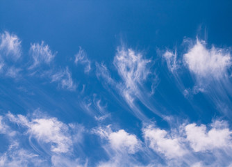 blue sky with soft clouds in the afternoon