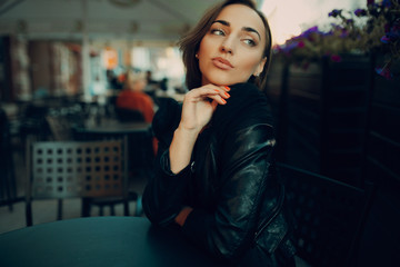 pretty girl sitting in a cafe