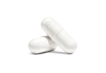 white pill capsule isolated on white background - obrazy, fototapety, plakaty