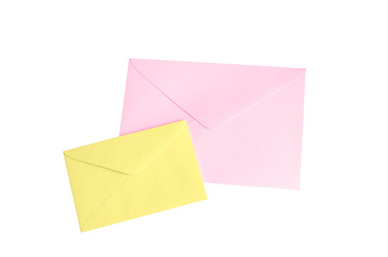 Pink and yellow envelope isolate on white with clipping path