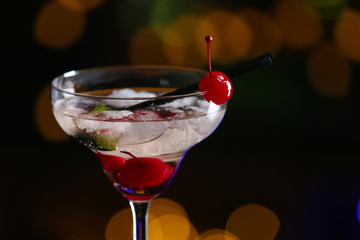 Glass of cocktails on bar background
