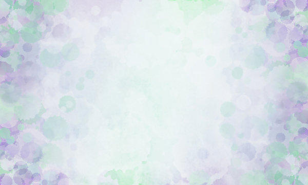 Abstract Watercolour Background - An artistic background with watercolour paint splashes in delicate green and purple colours.