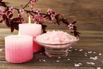 Spa still life with flowering branches on wooden background