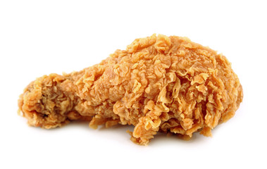 Golden brown fried chicken drumsticks on white background