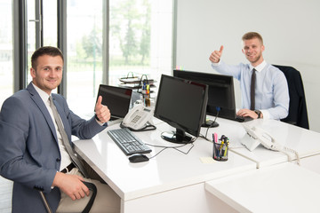 Businessmen Showing Ok Sign With His Thumb Up