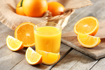 Fototapeta na wymiar Orange juice on table close-up