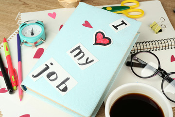 Inscription I love my job on workplace