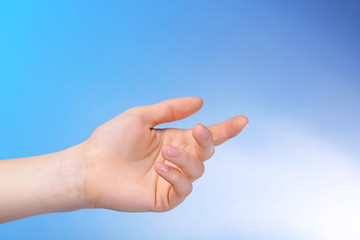 Female hand on colorful background