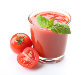 Glass of fresh tomato juice isolated on white
