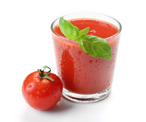 Glass of fresh tomato juice isolated on white