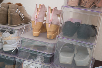 Shoes in a plastic box