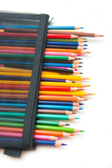 Fototapeta premium colorful of crayon wood in black bag
