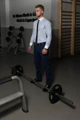 Fototapeta na wymiar Portrait Of A Businessman In Gym