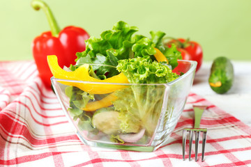 fresh vegetable salad in bowl on table close up