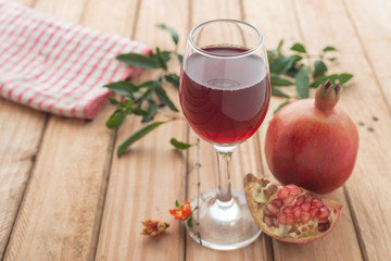 Shallow focus of organic Pomegranate Juice healthy drink