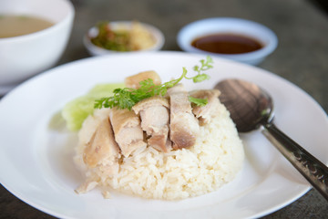 rice steamed with chicken soup.