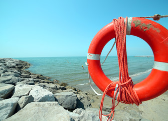 Orange jackets with rope to rescue swimmers