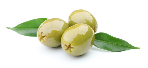 Green olives with leaves isolated on white