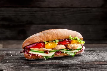 Wall murals Snack Sandwich with chicken, cheese and vegetables