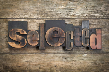 selected, word written with vintage letterpress printing block