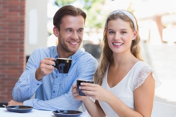 Cute couple drinking a coffee together