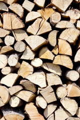 Fire wood background texture, firewood in a pile