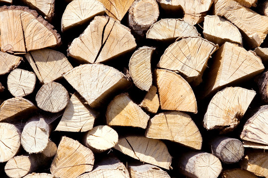 Fire wood background texture, firewood in a pile