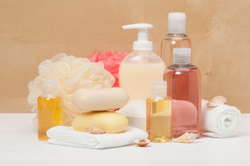 Fototapeta na wymiar Shampoo, Liquid Soap, Aromatic Bath Salt And Other Toiletry