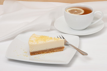 Cheese Cake With Lemon Zest. Tea With Lemon Slice