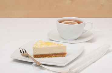 Cheese Cake With Lemon Zest. Tea With Lemon Slice