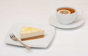 Cheese Cake With Lemon Zest. Tea With Lemon Slice