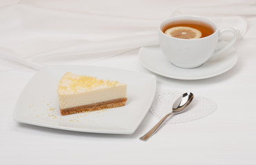 Cheese Cake With Lemon Zest. Tea With Lemon Slice