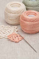 Crochet Lace And Threads. Natural Linen Background